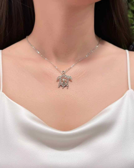 Silver Turtle Pendant Necklace – elegant women’s sea turtle necklace in shimmering silver.