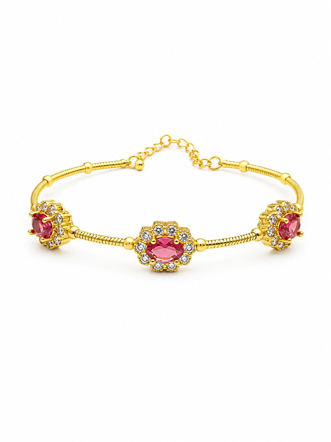 A gold-toned bracelet featuring three oval pink gemstone clusters, each surrounded by small clear stones, displayed on a clean white background.
