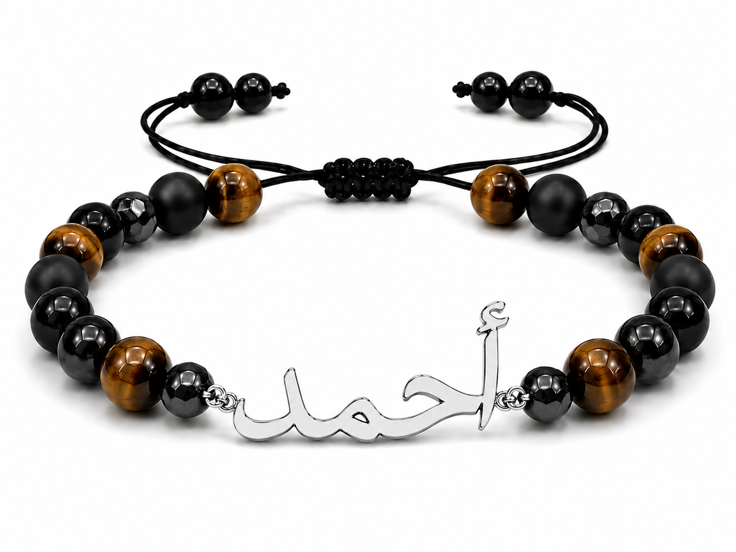 Bracelet with black, brown, and silver beads and a silver charm on a white background