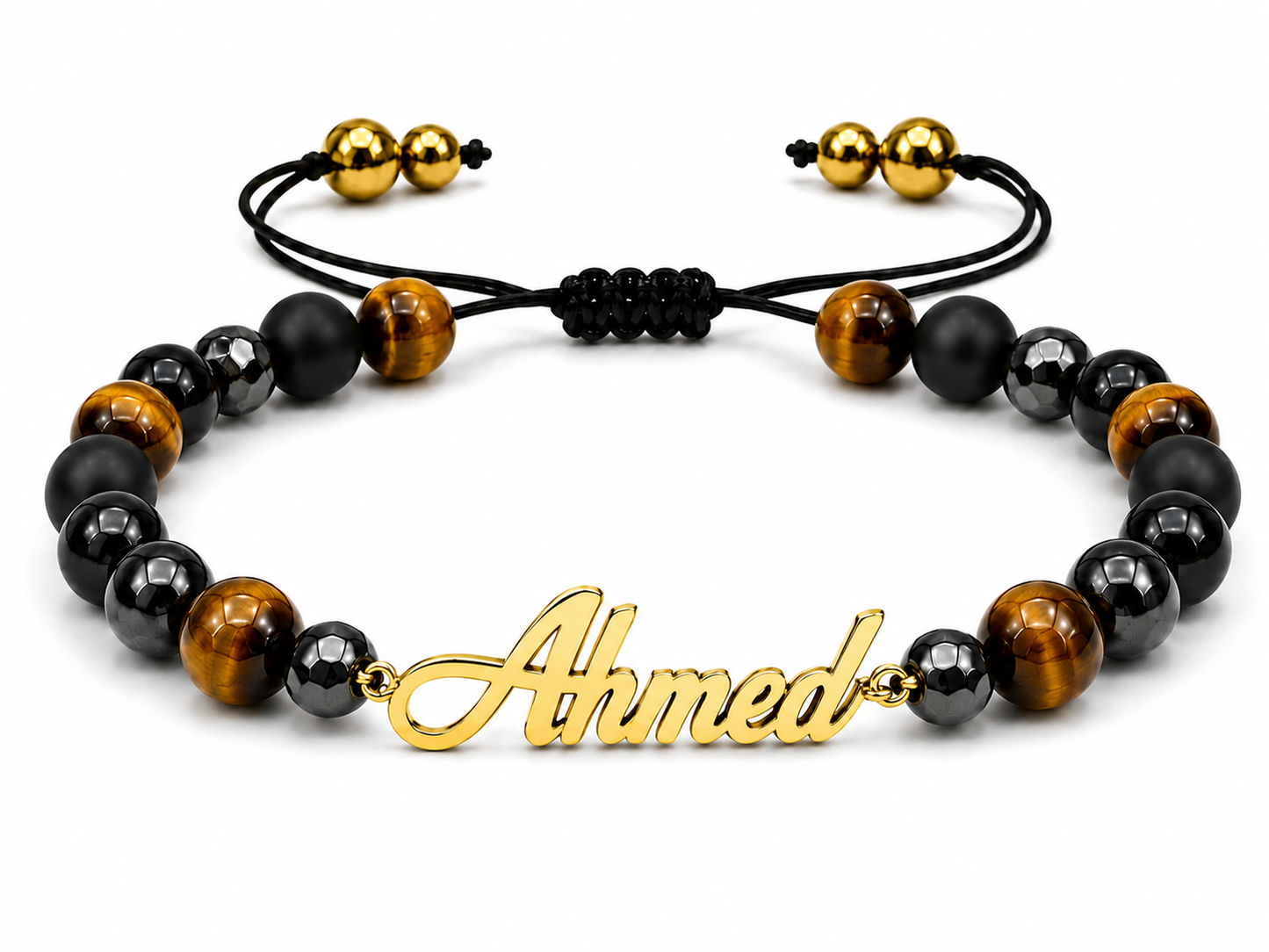 Bracelet with black, brown, and gold beads and a gold 'Ahmed' charm on a white background