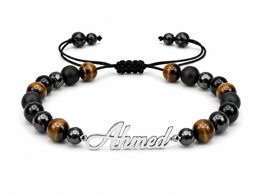 Beaded bracelet with 'Ahmed' charm on a white background