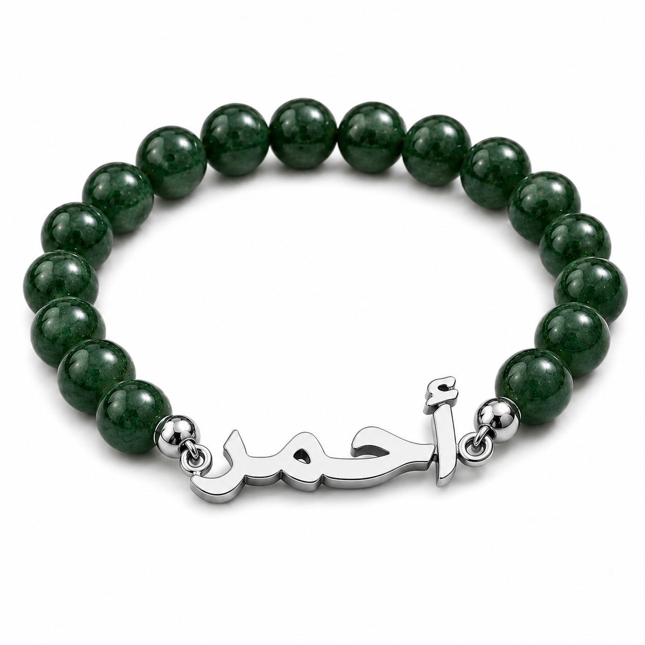 Green beaded bracelet with a silver name charm on a white background
