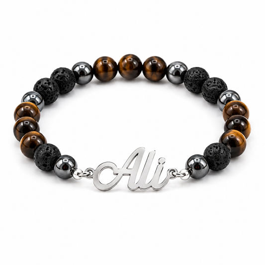 Bracelet with beaded design and 'Ali' charm on a white background