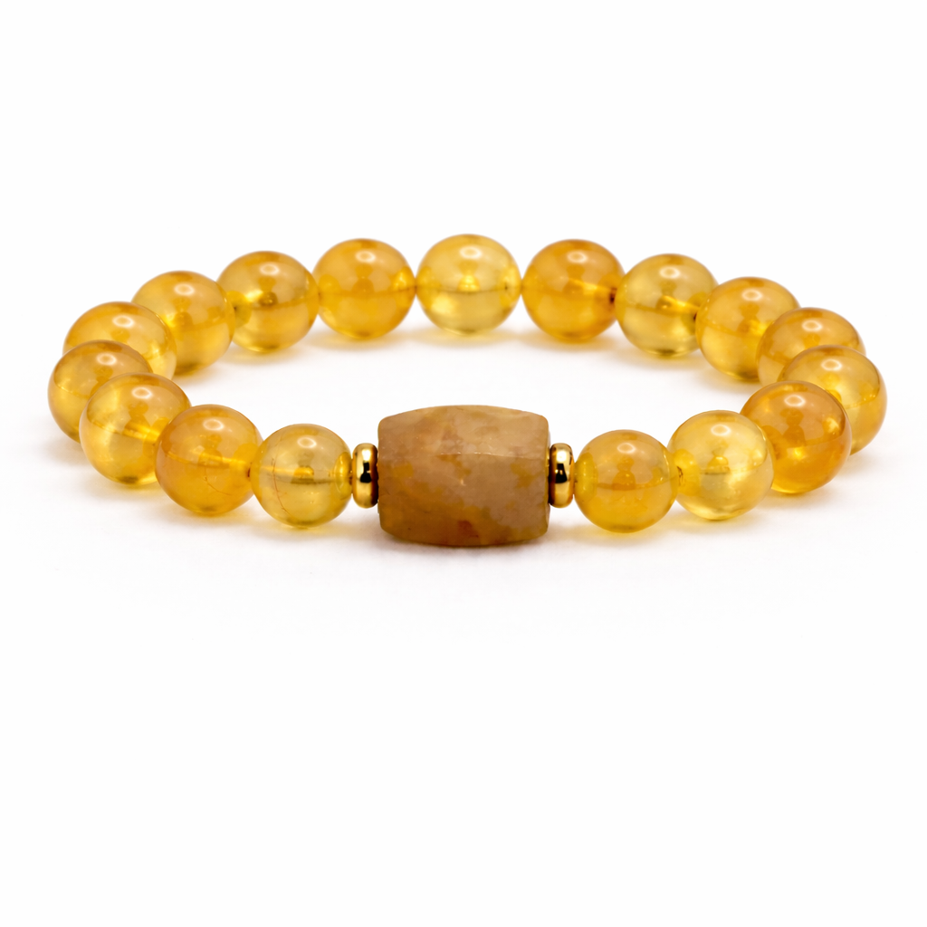 Beaded bracelet with yellow beads and a large brown bead on a white background