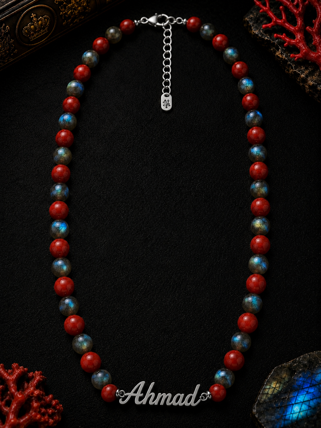 Necklace with red and blue beads on a dark background