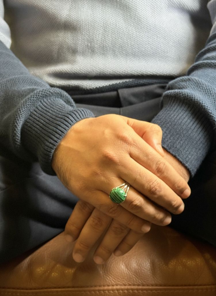Green Malachite stone ring for men displayed on hand with knit sweater