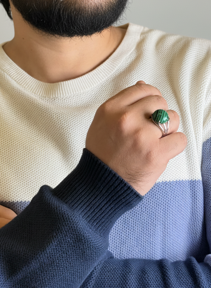 Man wearing a natural Malachite male ring with silver finish