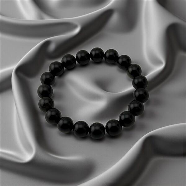 ShadowGuard – 10mm  Stone: Black Obsidian (For protection, energy shielding, and clearing negativity)